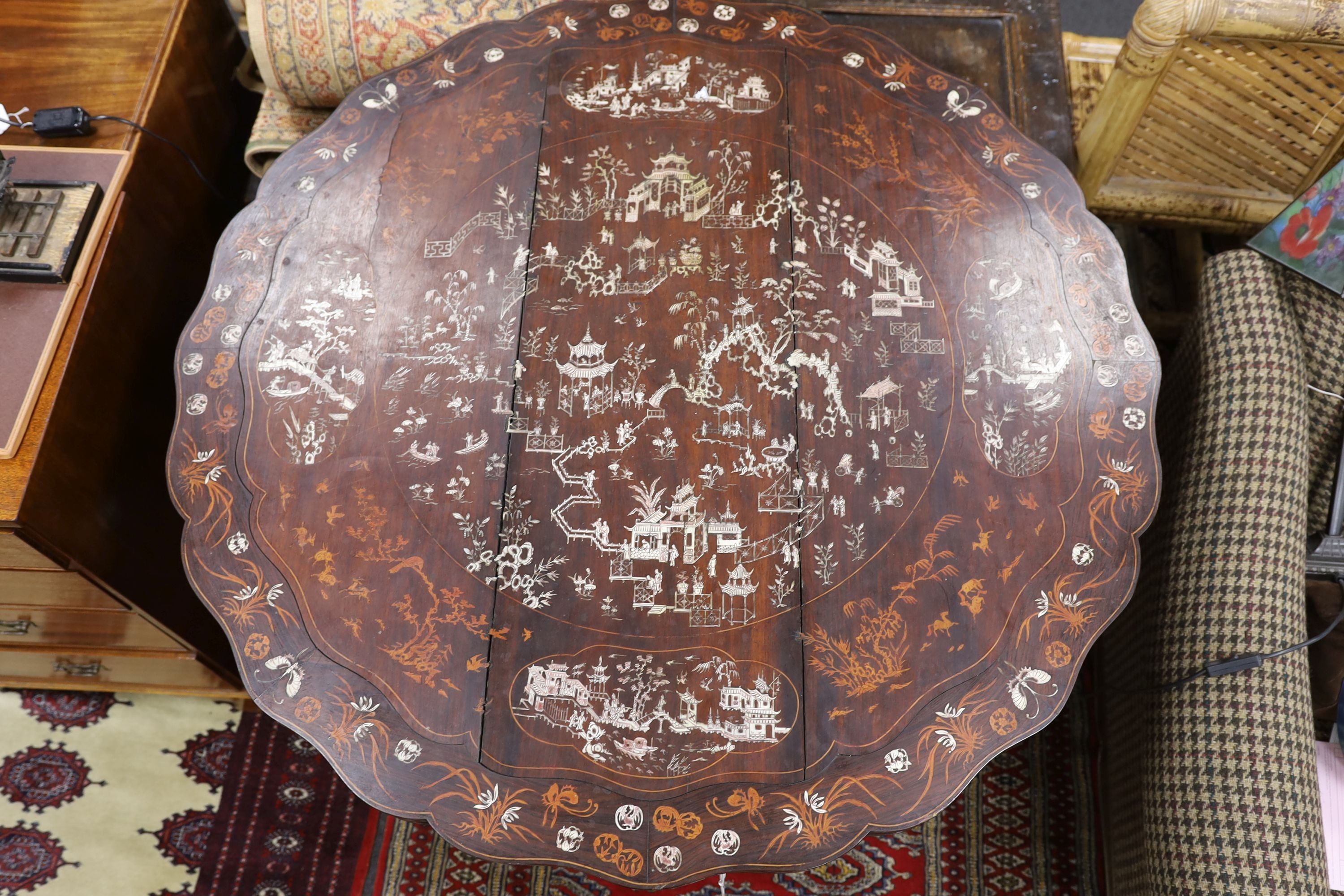 A Chinese carved hardwood circular inlaid centre table, diameter 122cm, height 87cm